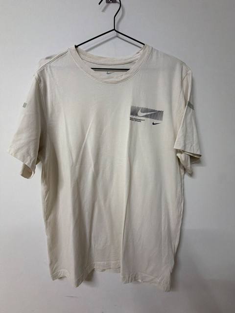 Nike Performance Sport Apparel Camiseta Beige Vintage Streetwear
