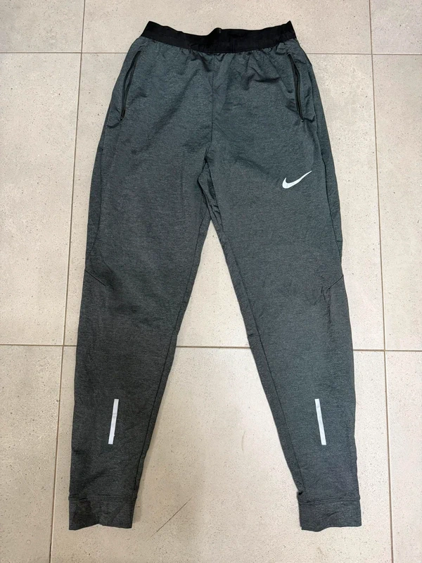 Pantalón Nike Running Dri-Fit gris